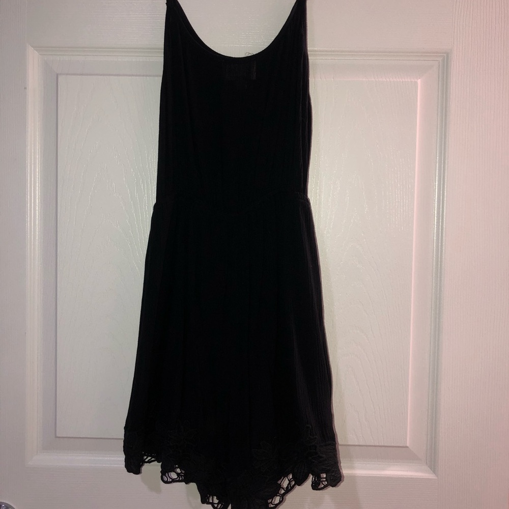 Black romper with lace detailing